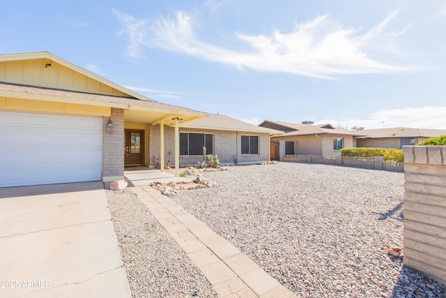 ranch-style house featuring a garage