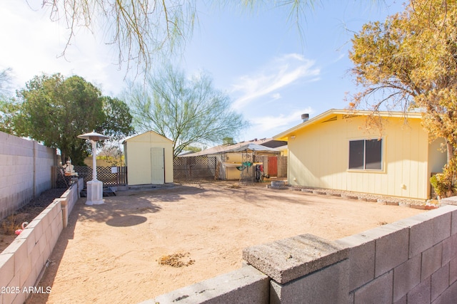 exterior space featuring a shed