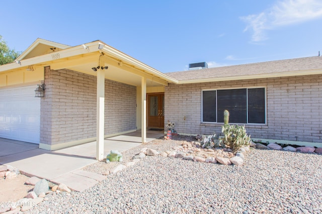 property entrance with a garage