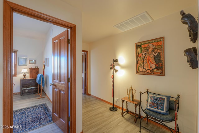 hallway featuring light wood-type flooring