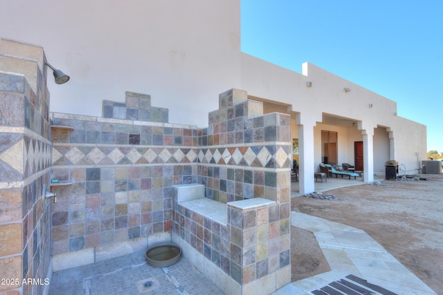 view of patio featuring central AC unit