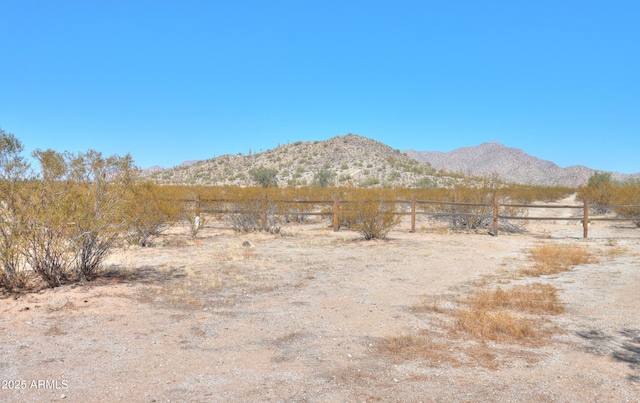 view of mountain feature with a rural view