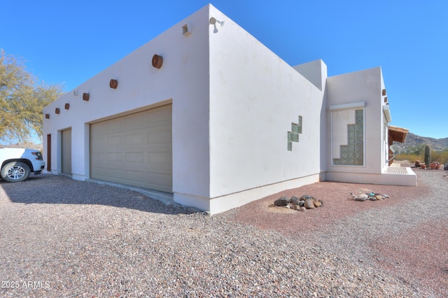 view of home's exterior featuring a garage