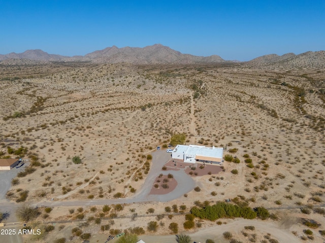 drone / aerial view featuring a mountain view