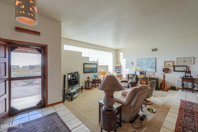 living room featuring light tile patterned floors