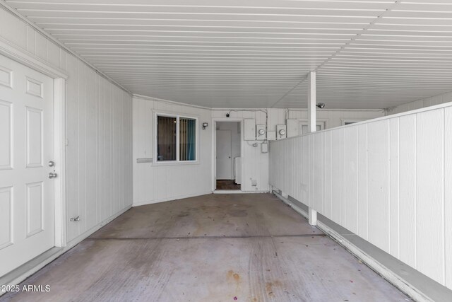 exterior space with an attached carport