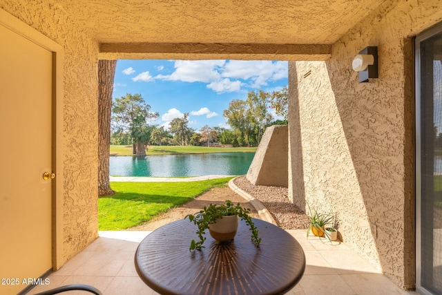 view of patio / terrace featuring a water view