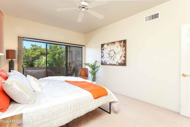 carpeted bedroom featuring ceiling fan and access to exterior