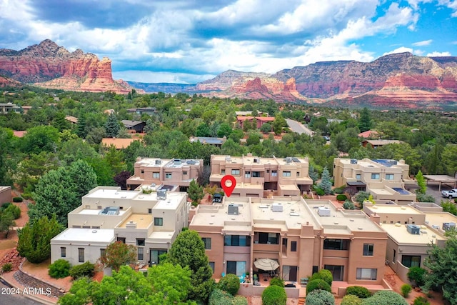 drone / aerial view featuring a mountain view