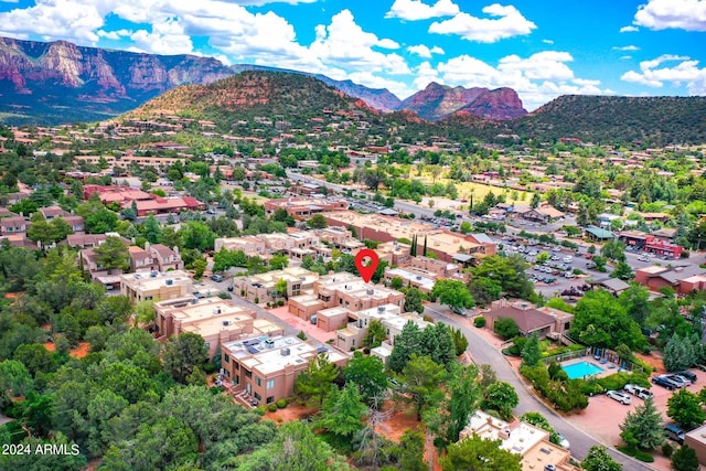 bird's eye view with a mountain view