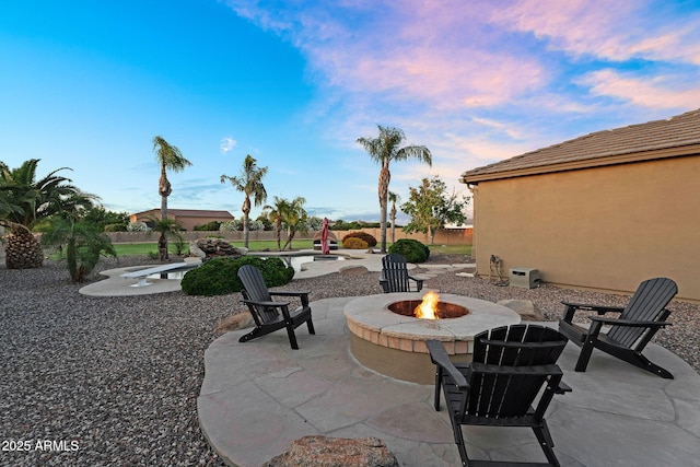18822 E Flintlock Dr, Queen Creek, AZ 85142 - view of patio / terrace featuring an outdoor fire pit