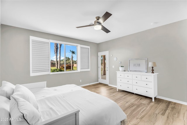 18822 E Flintlock Dr, Queen Creek, AZ 85142 - bedroom featuring baseboards, a ceiling fan, and light wood-type flooring