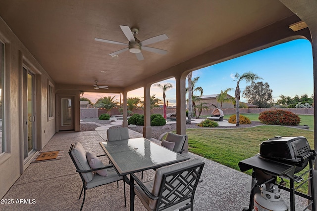 18822 E Flintlock Dr, Queen Creek, AZ 85142 - view of patio / terrace with area for grilling, ceiling fan, fence, and outdoor dining area