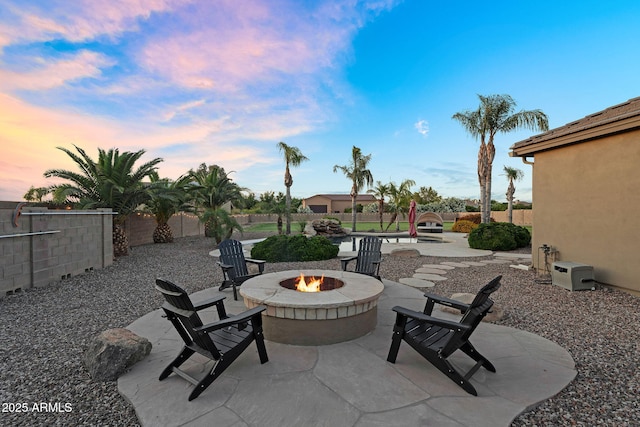 18822 E Flintlock Dr, Queen Creek, AZ 85142 - view of patio with a fenced backyard and a fire pit
