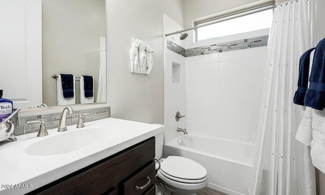 full bathroom with toilet, decorative backsplash, vanity, and shower / tub combo with curtain