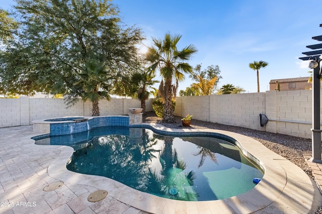 view of pool featuring an in ground hot tub and a patio area