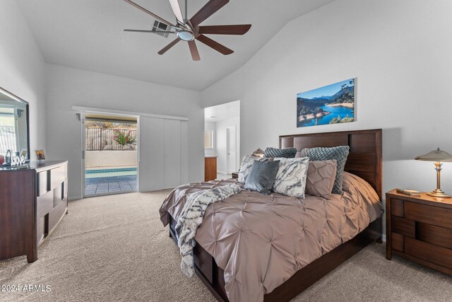 bedroom featuring lofted ceiling, access to exterior, ceiling fan, and light carpet