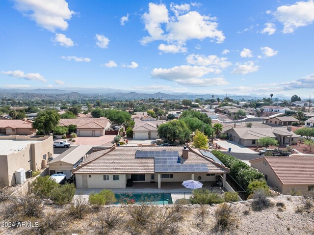 drone / aerial view featuring a mountain view