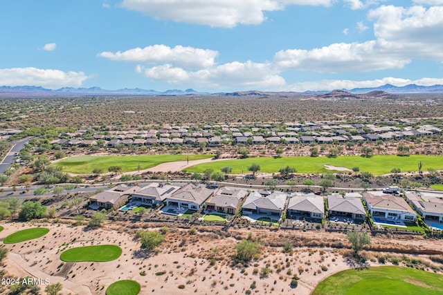 birds eye view of property featuring a mountain view