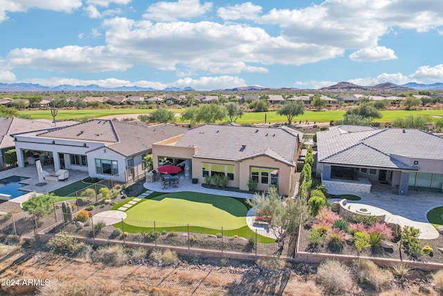 bird's eye view with a mountain view