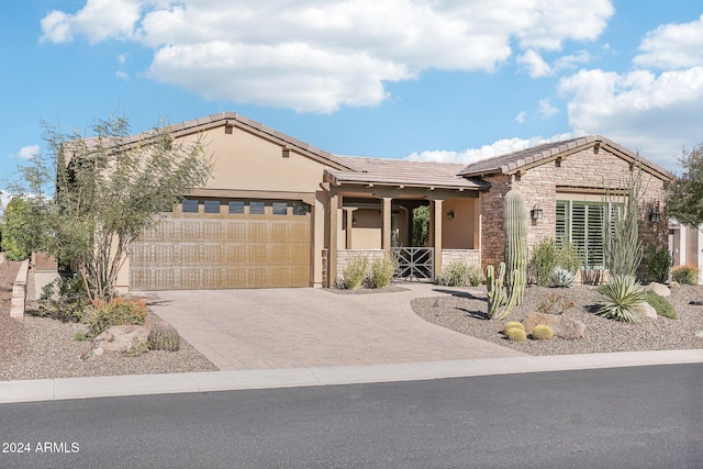 single story home with a garage