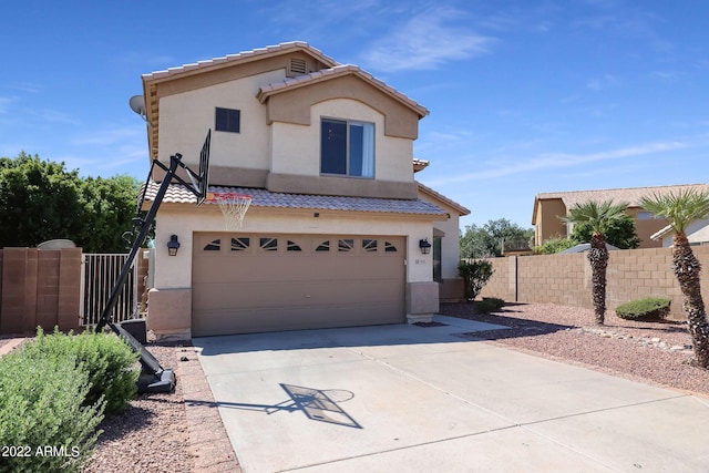 view of front of property with a garage