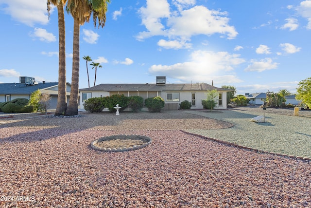 ranch-style home featuring a patio area