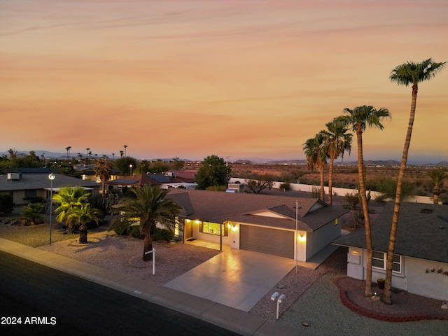 view of front of property featuring a garage