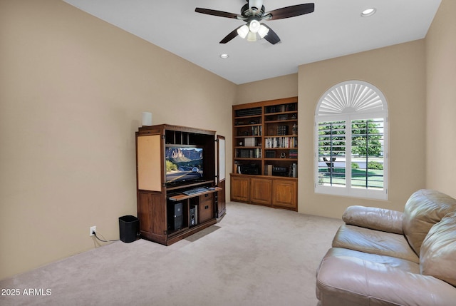 1940 N Stevens Cir, Mesa, AZ 85205 - living area with light carpet, a ceiling fan, and recessed lighting