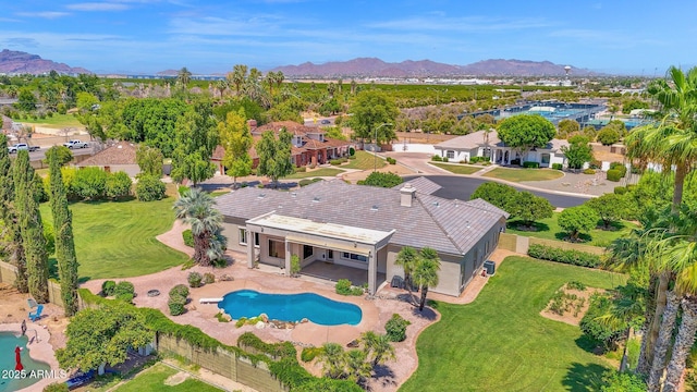 1940 N Stevens Cir, Mesa, AZ 85205 - aerial view of property and surrounding area featuring mountains and nearby suburban area