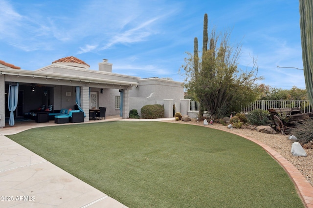 view of yard with an outdoor hangout area and a patio