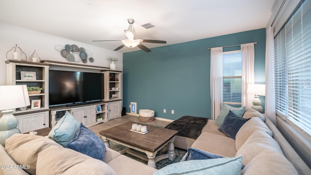 living room with ceiling fan