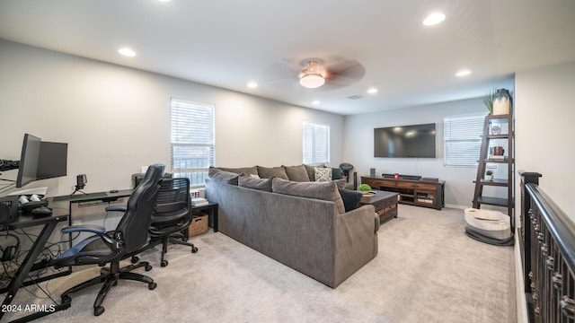 living room with light carpet and ceiling fan