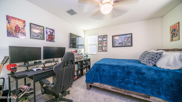 bedroom with ceiling fan and carpet floors