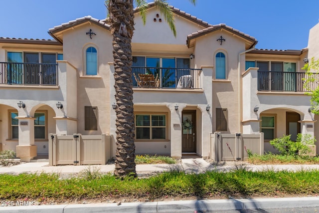 4711 S Vapor, Mesa, AZ 85212 - view of front facade with a balcony, a gate, stucco siding, and a tile roof