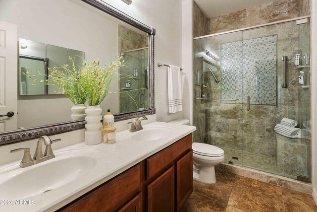 2736 E Sourwood Dr, Gilbert, AZ 85298 - full bath featuring toilet, double vanity, and a stall shower
