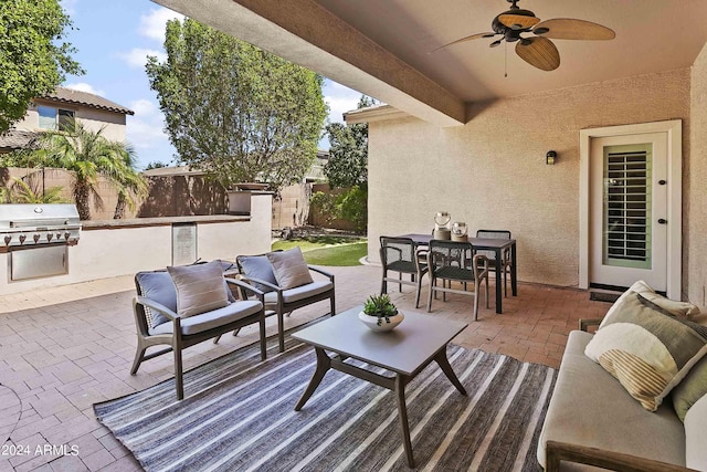 2736 E Sourwood Dr, Gilbert, AZ 85298 - fenced backyard featuring a patio, outdoor dining area, a ceiling fan, and an outdoor living space