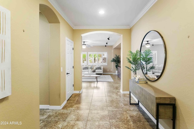 2736 E Sourwood Dr, Gilbert, AZ 85298 - corridor with crown molding, arched walkways, and baseboards