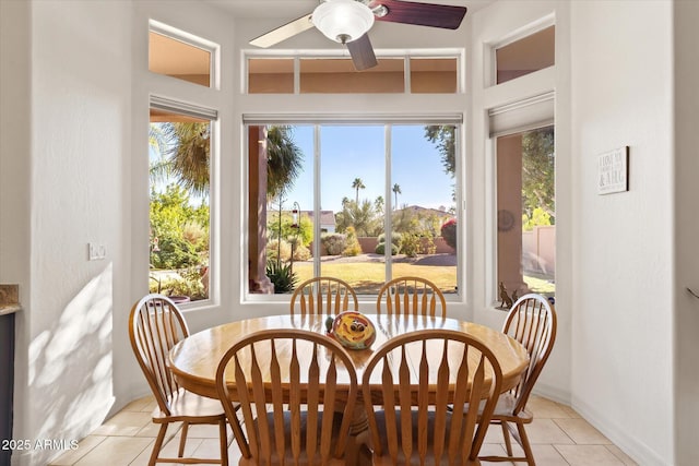 sunroom / solarium with ceiling fan and a wealth of natural light