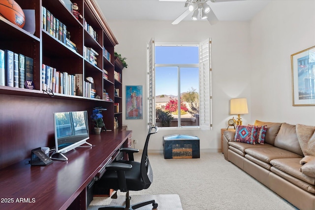 office with ceiling fan and carpet flooring