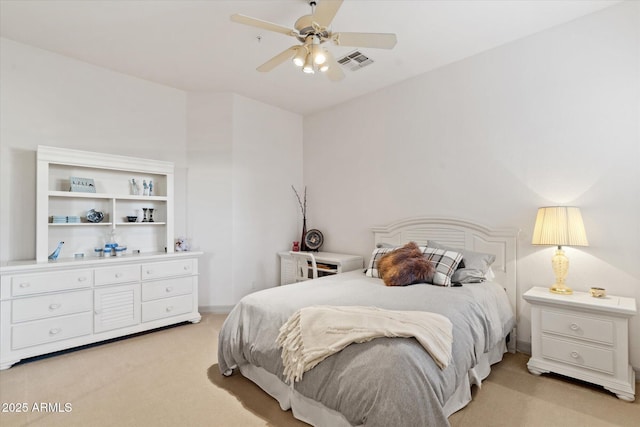 bedroom with light colored carpet and ceiling fan