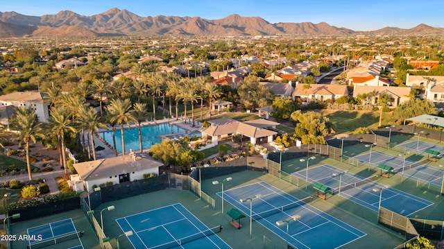 birds eye view of property featuring a mountain view