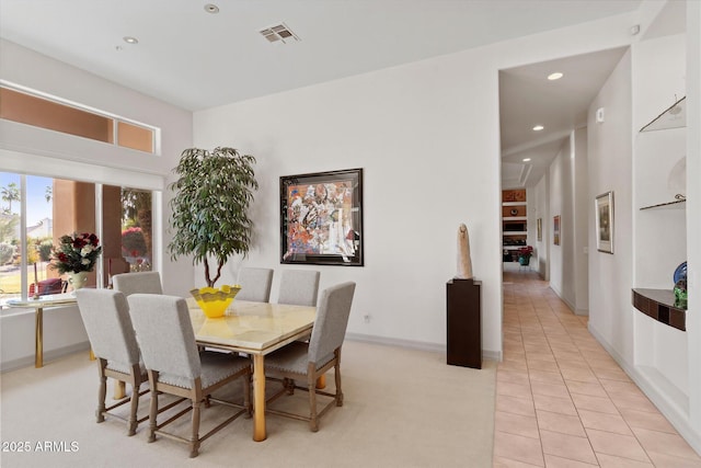 view of tiled dining space