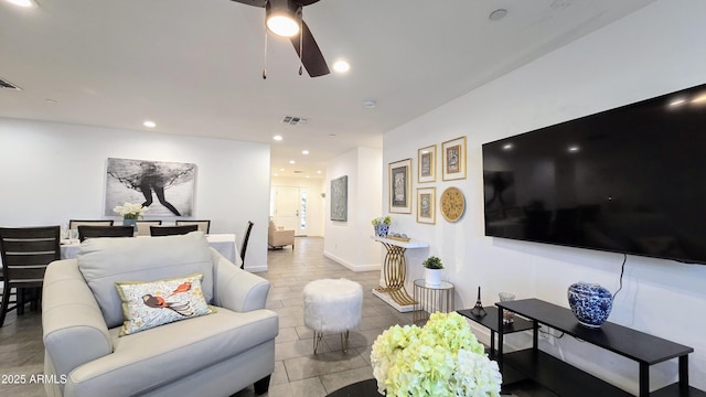 3128 E Desert Cove Ave, Phoenix, AZ 85028 - tiled living room with ceiling fan and recessed lighting