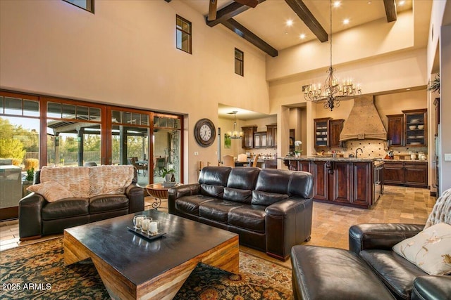 living room featuring a chandelier and beam ceiling