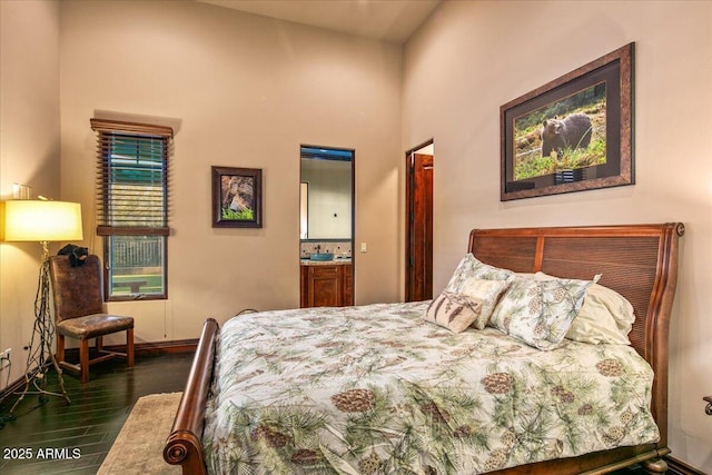 bedroom with dark wood-style floors