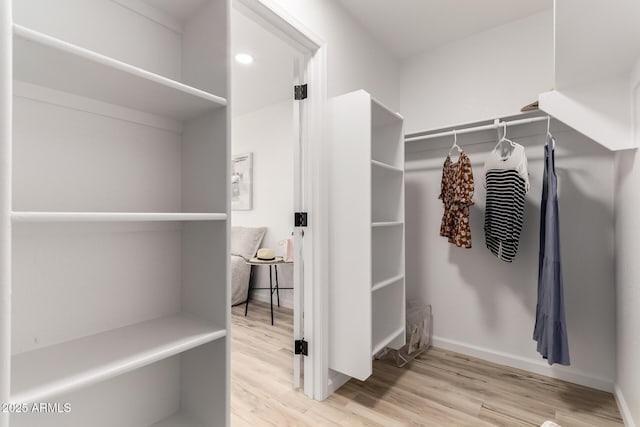 10625 E Bramble Ave, Mesa, AZ 85208 - walk in closet with wood finished floors
