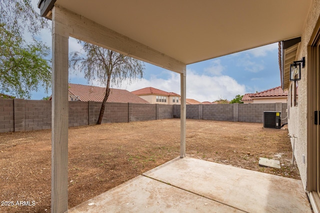 10625 E Bramble Ave, Mesa, AZ 85208 - fenced backyard featuring central AC and a patio area