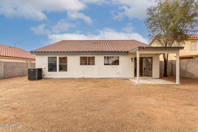 10625 E Bramble Ave, Mesa, AZ 85208 - back of house with central AC unit, a fenced backyard, a patio area, and a tile roof