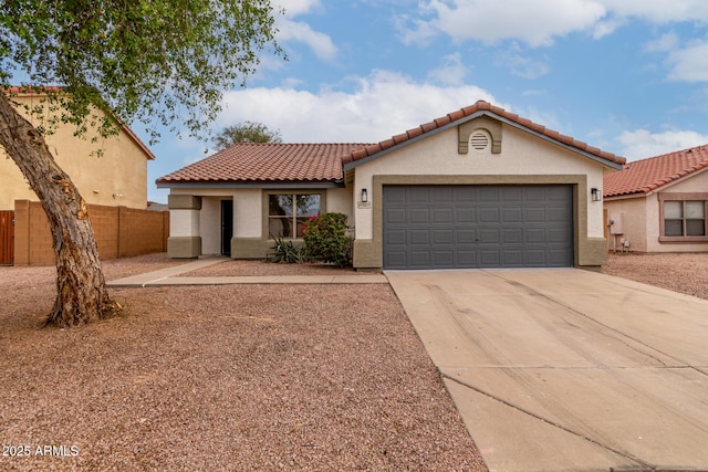 10625 E Bramble Ave, Mesa, AZ 85208 - mediterranean / spanish home featuring stucco siding, driveway, an attached garage, and a tiled roof